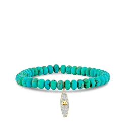 Gold & Diamond Happy Face Surfboard on Turquoise