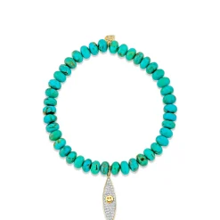 Gold & Diamond Happy Face Surfboard on Turquoise