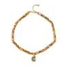 Gold & Diamond Nautilus Shell Abalone Anklet