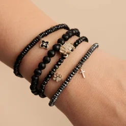 Gold & Diamond Paw on Black Spinel