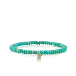 Gold & Diamond Tequila Shot on Turquoise