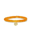 Gold & Diamond Tiny Bee Coin on Amber