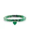 Gold & Enamel Heart on Shaded Emerald