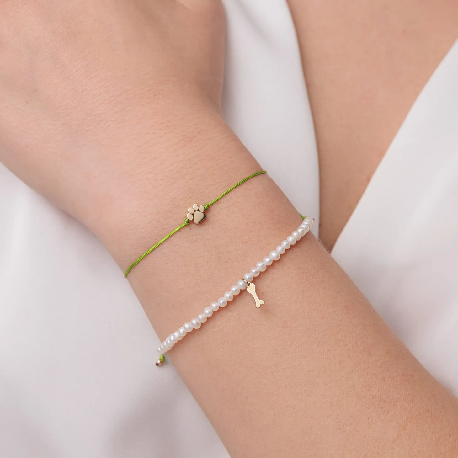 Pure Gold Tiny Dog Bone on Pearls