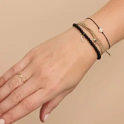 Pure Gold Tiny Love on Onyx