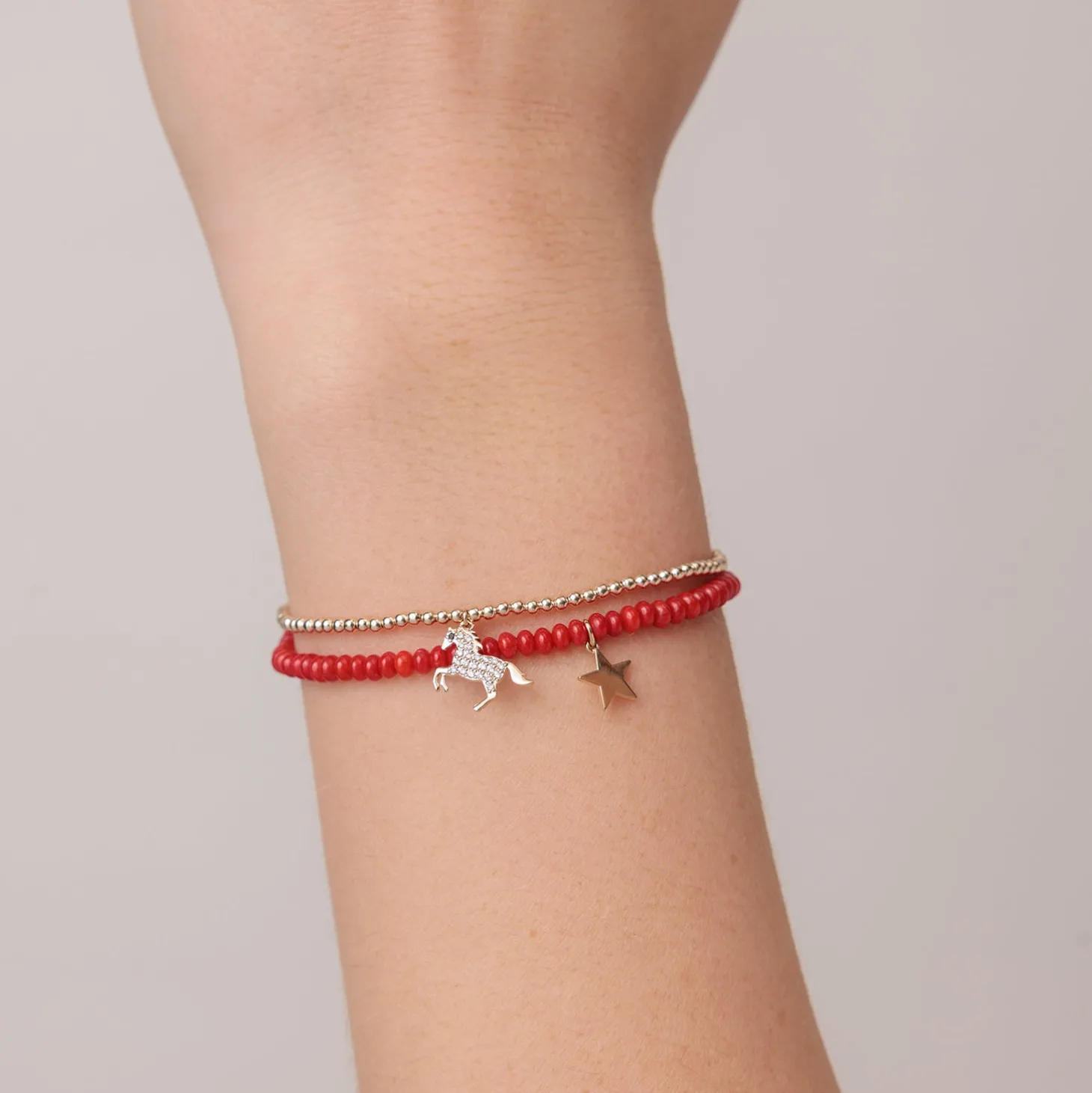 Pure Gold Tiny Star on Red Sea Bamboo